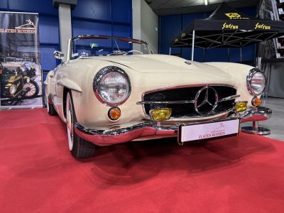 Classic roadster front view with round headlights and chrome bumper