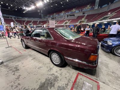Classic luxury coupe rear with alloy wheels