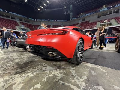 Rear view showing exhaust and wheel design at auto show