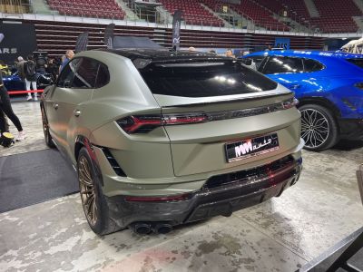 Matte finish SUV rear with quad exhausts and sporty diffuser