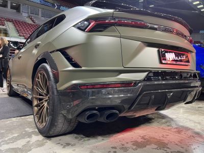 Matte finish SUV rear with carbon fiber diffuser and quad exhaust tips