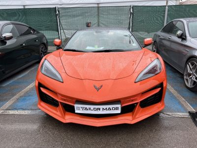 Front view with aggressive headlights and aerodynamic hood