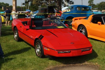 Red convertible with pop-up headlights and sporty sleek design