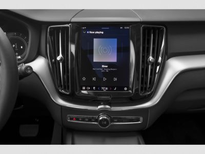 Central touchscreen infotainment system and dashboard controls