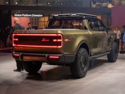 Rear view with LED light bar and rugged off-road tires