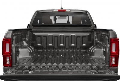 Open and spacious pickup truck cargo bed with tailgate down.