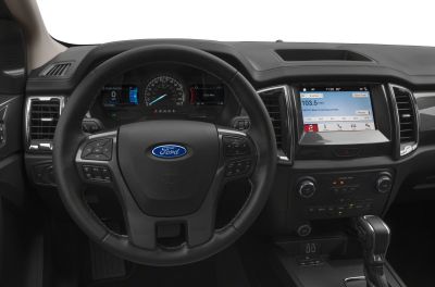 Steering wheel with multi-function controls and digital instrument cluster