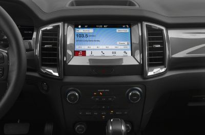 Touchscreen infotainment system with climate controls and media functions
