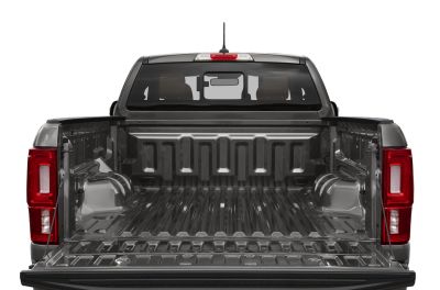 Open cargo bed with lowered tailgate and metal bed liner