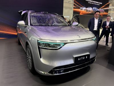 Close-up of front LED headlights and sleek front body