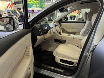Beige leather interior with digital cockpit and modern dashboard