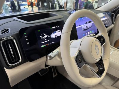 Digital dashboard with dual screens and leather steering wheel