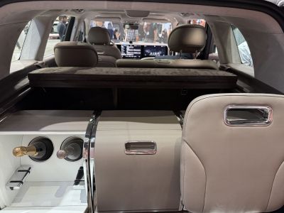 Rear interior with integrated storage and bottle holders