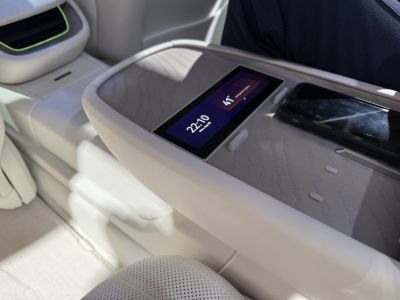 Digital display screen and sleek center console with phone storage