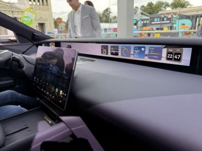 Dual wide digital screens on car dashboard and center console
