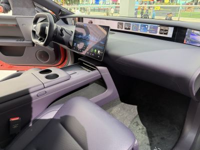 Dual digital screens and minimalist dashboard interior