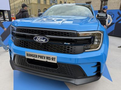 Front grille and headlights of a modern blue pickup