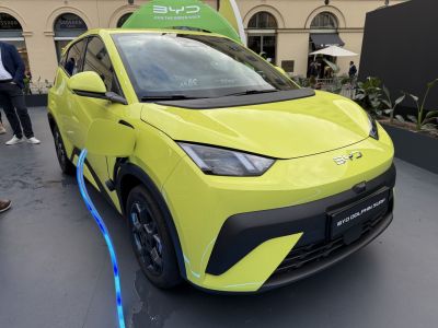 Electric car charging with LED illuminated cable and sleek futuristic design