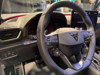 Multifunction leather steering wheel with Cupra logo and control buttons