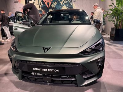 Front view with aggressive headlights and sporty grille