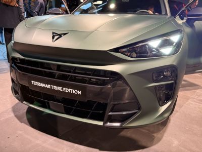 Front view with LED headlights and bold grille