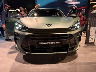 Sharp headlights and aggressive grille on a modern SUV front.