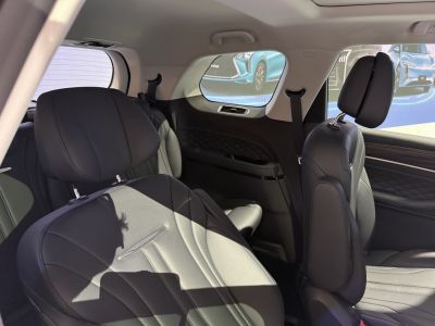 Spacious rear interior with leather upholstery and adjustable headrests