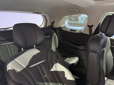 Leather seats and spacious interior cabin with side window