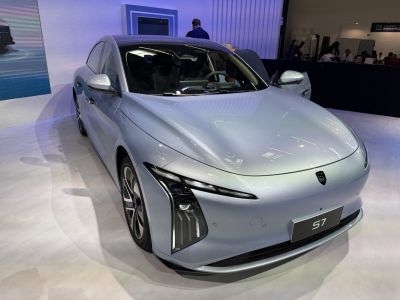 Sleek front design with distinctive LED headlights and aerodynamic shape.