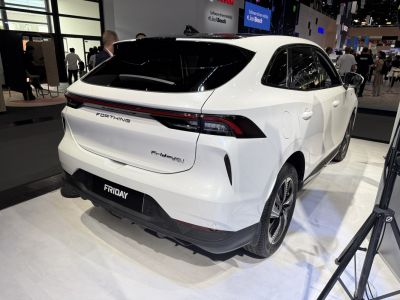 Rear view of sleek white SUV with modern taillights and aerodynamic design