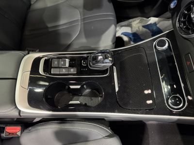 Center console with crystal gear shifter and dual cup holders