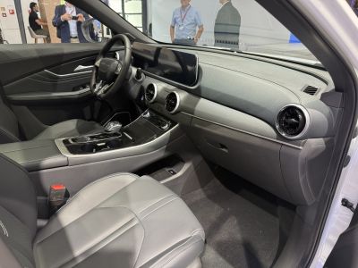 Modern car interior with digital dashboard and sleek central console