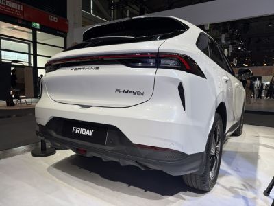 Rear view of a modern electric SUV with distinct taillights and aerodynamic features