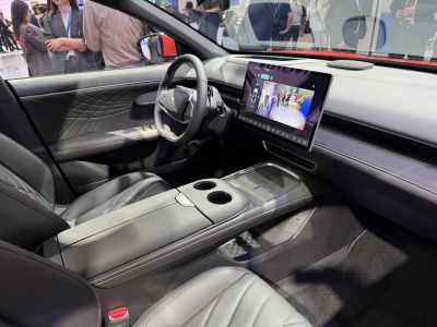 Modern car interior with large touchscreen and minimalist dashboard