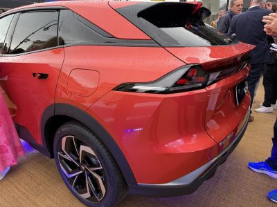 Rear section and alloy wheel with sleek taillights and bold contours