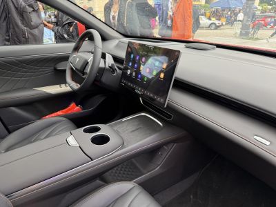 Large touchscreen and premium leather interior in modern SUV cabin