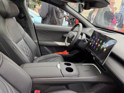 Premium leather seats and large touchscreen display inside car interior