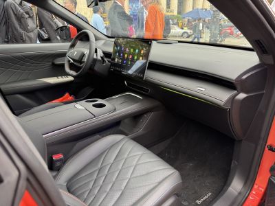 Digital dashboard and quilted leather seats in car interior