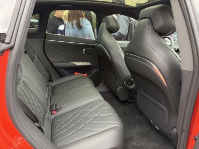 Luxurious rear leather seats with detailed stitching and modern design