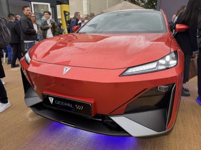 Front view with sharp LED headlights and aerodynamic bumper design.