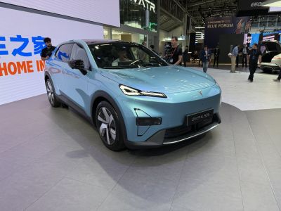 Electric compact SUV with sleek aerodynamic design and LED headlights