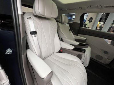 Premium leather interior seats with elegant stitching and armrests