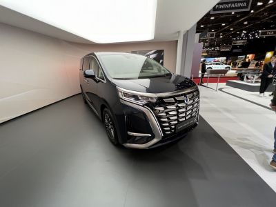 Luxury MPV with bold chrome grille and LED headlights
