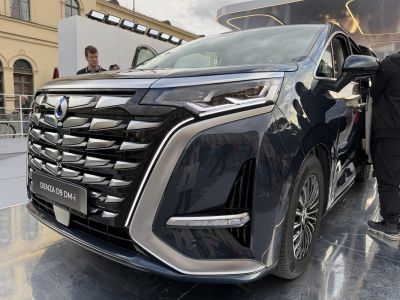 Front grille and LED headlights close-up with alloy wheel.