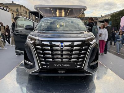 Front view with intricate chrome grille and LED headlights