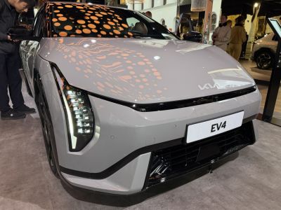 Front view of a hatchback with vertical LED headlights and aerodynamic design