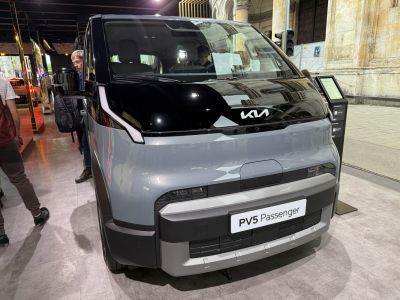 Compact futuristic front view with modern lighting and aerodynamic design