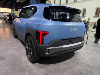 Futuristic SUV rear with bold LED tail lights and matte finish.
