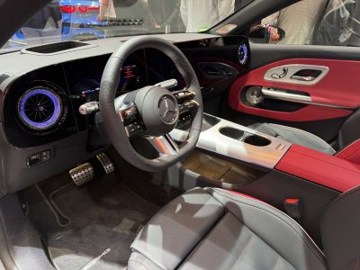 Modern car interior with digital cockpit and ambient lighting