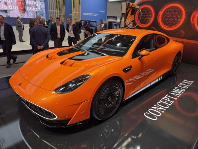 Aerodynamic hood vents with black accents and modern wheels.